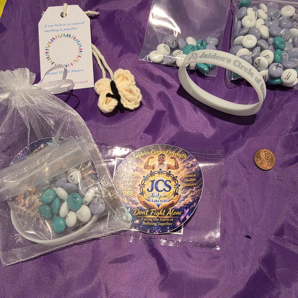 Jaiden's Circle of Strength wristband, tag, sticker, and candy giveaways